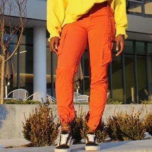 Orange cargo pants.